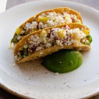 Cilantro Lime Chicken Tacos · 310cal two tacos, lettuce, yellow pepper, tomato, cilantro lime vinaigrette, queso fresco