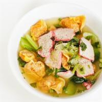 Wonton Soup · A minced chicken with Thai spices, wrapped with wonton skin, in a clear broth soup, and mixe...