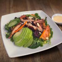 Chicken Salad · Spring mix topped with tomato, cucumber, avocado, almond and grilled chicken served with hou...
