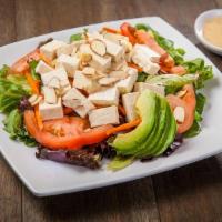 Tofu Salad · Spring mix topped with tomato, cucumber, avocado, almond and tofu served with house dressing
