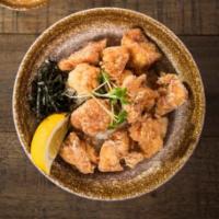 Kara Age Bowl · Steamed white rice topped with fried popcorn chicken and seaweed, served with spicy mayo