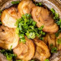 Chashu Bowl · Steamed white rice topped with pork chashu, seaweed, green onion and chashu sauce