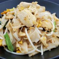 Bangkok Noodle · Pan fried flat noodle with Chicken, egg, bean sprouts and green onion, served with fresh let...