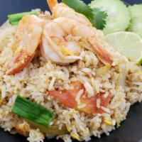 Thai Fried Rice · Aromatic jasmine rice pan fried With egg, onion, tomato and your choice of meat.