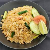 Crab Fried Rice · Pan-fried jasmine rice With crab meat, egg, and green onion.