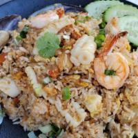 Seafood Fried Rice · Pan-fried jasmine rice with combination seafood, egg and green onion.