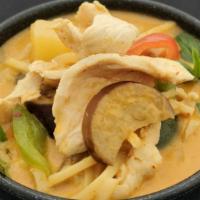 Red Curry · Hot. Your choice of meat in red curry, coconut milk, bamboo shoots, eggplant and fresh basil.