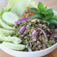 Larb Chicken · Spicy. Choice of minced meat with lime juice, red onion, mint leaves, ground chili, and roas...