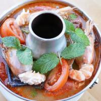 Tom Yum Shrimp · Spicy. Shrimp. Hot and sour lemongrass soup.