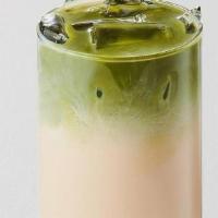 Matcha Oolong Milk Tea · Premium matcha from Japan layered with our roasted oolong milk tea