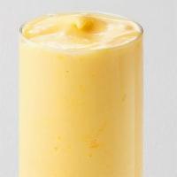 Mango Frostie · Fresh mango perfectly ice-blended with dried mango and our signature housemilk, served with ...