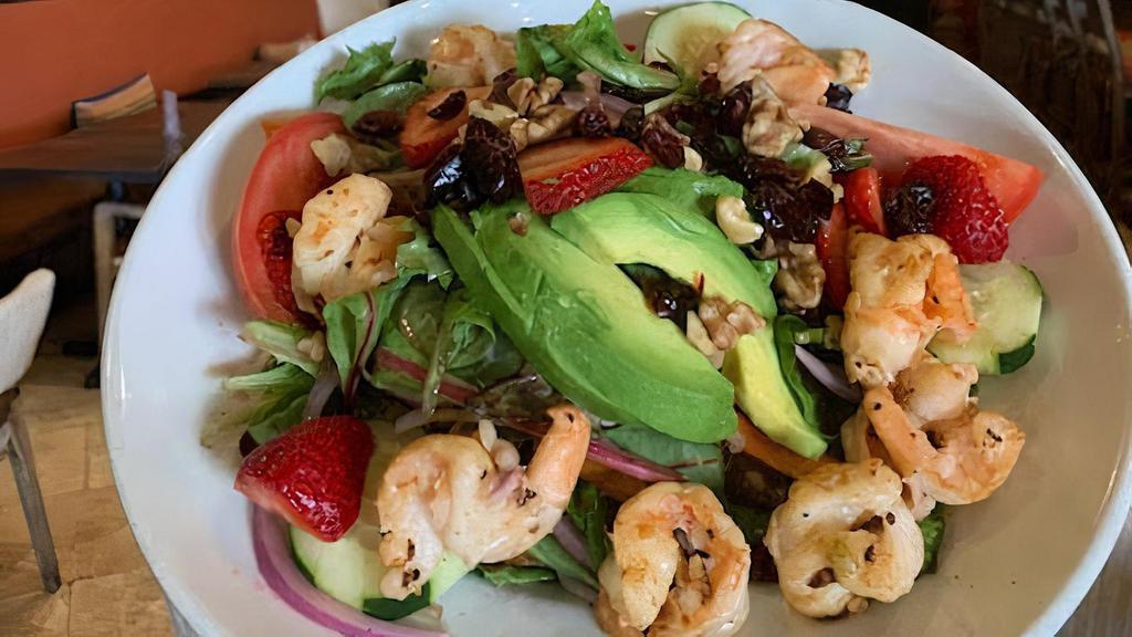 Ensalada Del Campo · mix baby greens salad, tomatoes, red onion, walnuts, carrots, seasonal berries and avocado, dressed with raspberry vinaigrette.