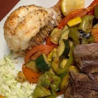 Surf And Turf · lobster tail and grilled marinated steak, served with tortillas and beans