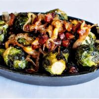 Glazed Brussel Sprouts · Roasted Brussel sprouts, pancetta, shallots, and honey mustard glaze.