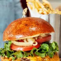 Cheese Burger · 100 percent Angus beef patty, grilled onions, cheddar, lettuce, tomato, pickles, truffle aio...
