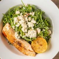 Salmon Salad · Arugula, blue cheese crumbles, toasted pine nuts, onion, lemon vinaigrette.