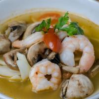 Tom Yum Cup Soup · Thai style hot and sour soup. Thai style hot and sour soup with mushrooms, onions, tomatoes,...