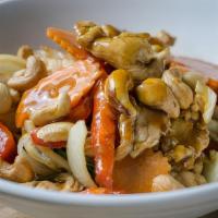 Kung Pao · Sauteed choice of meat with cashew nuts, onions, bell peppers, carrots with sweet chili sauc...