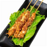 Chicken Kebab · Chicken kebab with spicy cumin sauce on the top. One kebab each order.