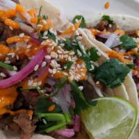 Solo Taco · All of our meats are made in-house. 
Toppings usually include onions, cilantro & salsa verde...
