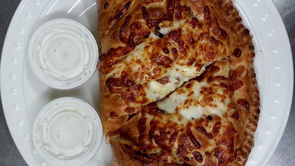 Small Calzone · Pizza pocket with mushrooms, garlic and chicken.