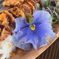 Bako · in - shrimp tempura - crab mix - cream cheese . top - eel - avocado - crunchy flakes . sauce...