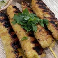 Chicken Satay 4Pcs · Chicken tenders marinated in coconut milk  and different spices  grilled on bamboo skewers. ...