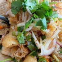 Yum Seafood · Shrimp, mussels, squid and fried fish tossed in a lime sauce. Mixed with white mushroom, cuc...