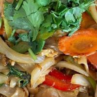 Drunken Noodles · Flat rice noodles, eggs,bell peppers, onions, Chinese broccoli, tomatoes, carrots and thai b...