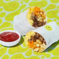 Impossible To Be Mad Impossible Breakfast Burrito · Two scrambled eggs, impossible beef, french fries, and melted cheese wrapped in a fresh flou...