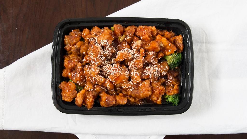 Sesame Chicken · Chunks of chicken with chef's special sauce with sesame seeds on top.