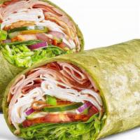 Oven Roasted Turkey & Ham · Take a bite of this Spinach wrap filled with a footlong portion of our tender, thin-sliced o...