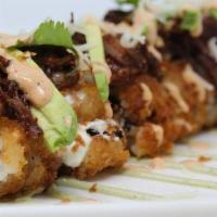 Birria · slow-simmered short rib, roasted guajillo sauce, avocado, cream cheese, chile gueros, shaved...