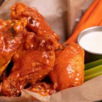 Wings · Buffalo, honey chipotle or Asian BBQ.