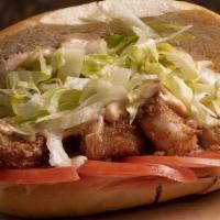 Shrimp Po Boy · Fried shrimp in a French roll with lettuce, tomato & creole spread.