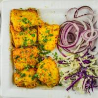 Amritsari Fish Tikka · IKP specialty dish. White fish cubes marinated in tandoori masala and crushed garlic cooked ...