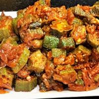 Bhindi Do Pyaza (Okra) · Fresh okra cooked with flavored spices, tossed with diced onion and ginger.