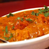 Butter Chicken · Exotic creamy butter sauce cooked with a blend of spices and fresh cilantro, ginger.