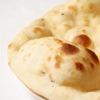 Plain Naan · Leavened bread cooked in tandoor.