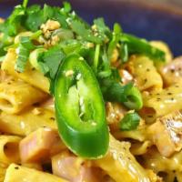 Spicy Ham Mac & Cheese · Freshly melted sharp cheddar and jack cheeses, mixed with diced ham, rigatoni noodles, Thai ...