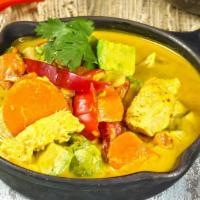 Yellow Curry · Coconut milk yellow curry with potatoes and carrot. Our most popular curry. Comes with White...