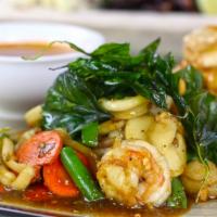 Pad Kra Pao · Spicy Basil dish sauteed with fresh chili, garlic, green bean, carot, and white onion.  Come...