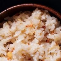 Brown Garlic Rice · Multi-grain brown rice with fried garlic and oil.