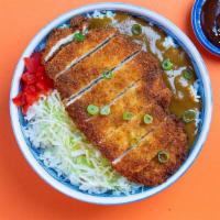 Chicken Katsu Curry Bowl · Fried chicken cutlet and Japanese style curry sauce over white rice topped with red pickles.