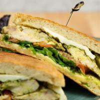 Chicken Pesto Panini · Pesto marinated chicken, roasted pepper, tomatoes, arugula, fresh mozzarella cheese