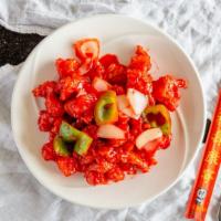 Sweet And Sour Chicken  · Chicken bell pepper onion and pineapple.