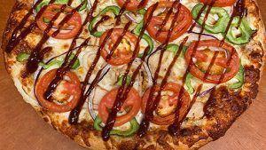 Western Bbq Chicken Pizza (Small) · BBQ chicken, red and white onions, bell peppers, and tomatoes.