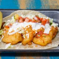 Baja Taco · Fish & shrimp on a flour tortilla topped with cabbage, pico de gallo, salsa, and cream. (fri...