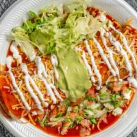 Wet Burrito · Inside: beans, cheese, and one (1) choice of meat
- Asada
- Al Pastor
- Carnitas 
- Grilled ...