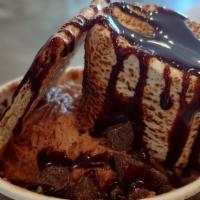 Mini S'Mores · Chocolate mini cup snow, giant marshmallow, graham cracker, chocolate syrup.